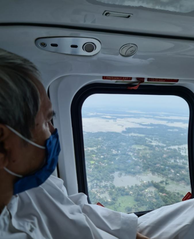 cm Naveen patnaik making an aerial survey of the damage caused by cyclone yaas