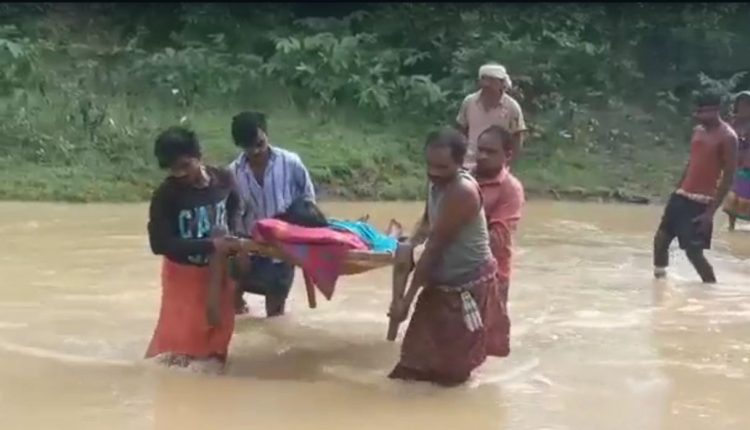 No Bridge Over Canal, Villagers Taking Patient On Bed In Kamakhyanagar