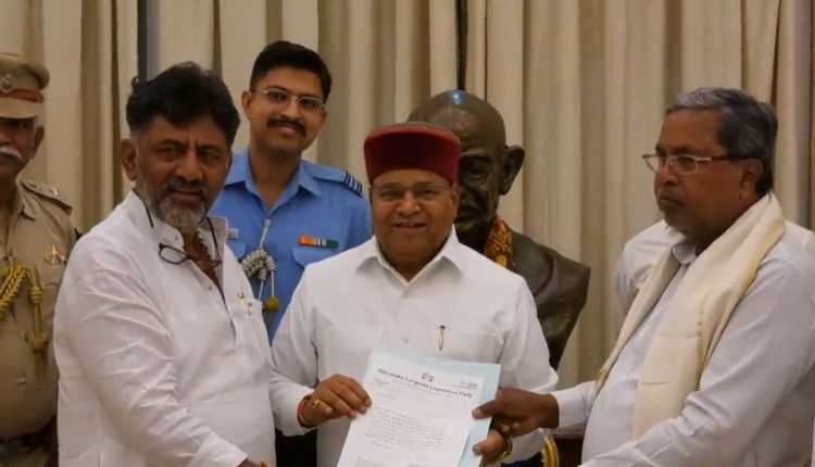 Siddaramaiah, Shivakumar meet governor, stake claim to form govt